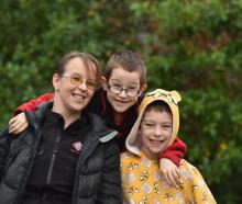 Annette Churchill and sons Daniel Dustow and Braith Dustow, in 2018. PHOTO: PETER MCINTOSH