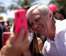 Presidential candidate Jose Antonio Kast meets with supporters at a recent campaign rally in...