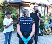 Brian Tamaki, pictured with his wife Hannah Tamaki, as he was being arrested on Monday last week....