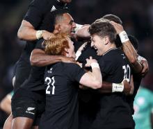 All Blacks loose forward replacement Pita Gus Sowakula (centre) celebrates with team-mates (from...