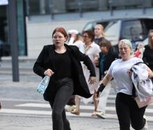 People flee the scene of a mass shooting in the Danish capital Copenhagen. Photo: Reuters 