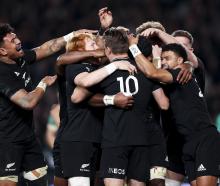 The All Blacks celebrate Pita Gus Sowakula's second half try during an impressive win over...
