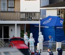 Police launched a homicide investigation after the remains of a body were found at a property in...