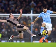 Tottenham Hotspur's Oliver Skipp (left) in action with Manchester City's Mateo Kovacic. Photo:...