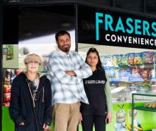 Outside the new Frasers Convenience store are, from left, manager Mellissa Taylor and owners...