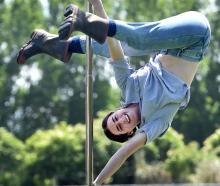 Shannon Miller shows the skills which won her a national pole performer title. PHOTO: PETER MCINTOSH