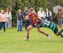 UC’s Jae Broomfield tries to evade a Linwood tackler during his side’s 28-3 win at the weekend....