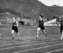 H.D. Morgan (left) wins the 100 yards race for Otago at the Easter inter-varsity tournament. —...