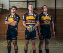 Highlanders (from left) Jake Te Hiwi, Sam Gilbert and Ethan de Groot model their heritage jerseys...