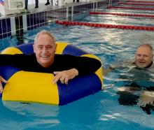 Mayor Phil Mauger and Hornby Ward councillor Mark Peters jumped in to the main pool fully clothed...