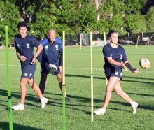 Otago Boys’ player Sonatane Tavake (left) and Southland Girls’ player Sualo Lofoga train with...