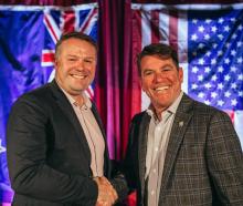 Queenstown Mayor Glyn Lewers (left) shakes hands with sister city Aspen’s Mayor Torre. PHOTO:...