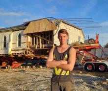 King House Removals labourer Jake Willis is part of the team that has loaded the former Lumsden...