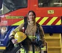 Local firey Tanya Stone with her firefighting kit, including breathing apparatus, she'll be...