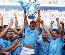 Manchester City celebrate their record fourth straight Premier League title. Photo: Reuters 
