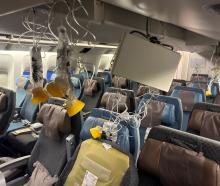 The interior of Singapore Airline flight SQ321 is pictured after an emergency landing at Bangkok...