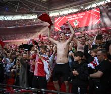 Southampton fans celebrate after winning the Championship Play-Off final against Leeds at Wembley...