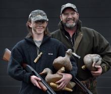 Ready for duck-shooting are Mason, 15, and Greg Hodge, of Mosgiel. PHOTO: PETER MCINTOSH