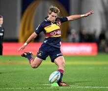 Cameron Millar of the Highlanders kicks for goal during tonight's Super Rugby Pacific match...