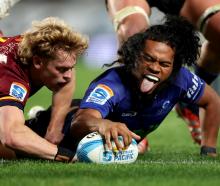 Taufa Funaki of the Blues scores his sides's sixth try. Photo: Getty Images