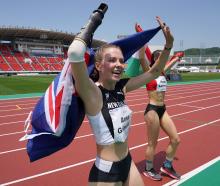 Anna Grimaldi celebrates her silver medal at the Para Athletics World Championships in Kobe,...