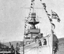 HMS Dunedin dressed to mark the anniversary of King George V’s Accession to the Throne. — Otago...