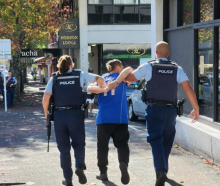 Police arrested this man after an incident in central Auckland this morning.  Photo: RNZ 