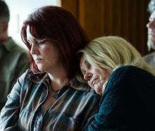 A still image released by the producers of Melanie Lynskey playing Anna Osborne, left, with Robyn...