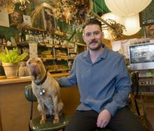 Troy Butler and sidekick John the dog are marking a busy decade in business. PHOTOS: GERARD O’BRIEN