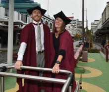 University of Otago PhD graduates Finn Ryder and Louise Bennett-Jones on the standing see-saw in...