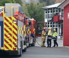 Firefighters deal with a hazardous substance spill caused by a pupil’s science project at Dunedin...