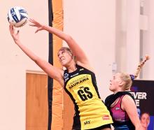 Pulse shooter Martina Salmon pulls in the ball against Steel defender Emilie Nicholson at the...