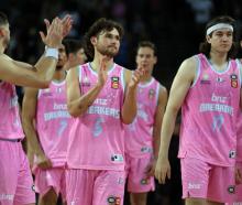 Breakers players celebrate during the round 19 NBL against the Cairns Taipans at Spark Arena in...