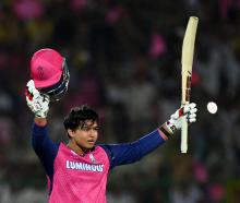 Rajasthan Royals' Vaibhav Suryavanshi celebrates after becoming the youngest player to score an...