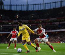 Crystal Palace's Eddie Nketiah and Arsenal's Jakub Kiwior in action during their Premier League...