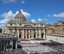 A packed St Peter's Square during the funeral of Pope Francis in the Vatican. Photo: Marco...