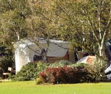A homeless man has built a wooden hut at the Oval sports field in Dunedin. Photo: Stephen Jaquiery