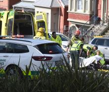 Emergency services attend a crash involving an e-scooter at the intersection of Cargill and...