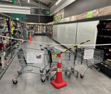 The area with scaffolding at Woolworths, to the right of the gasworks, is roped off internally....