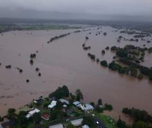 A drone view shows a flooded area following heavy rains, in Tinonee, New South Wales yesterday....