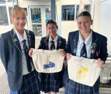 Cromwell College pupils (from left) Ayala Cunningham, Lizzie Engstrom and Lani Jones are donating...