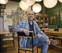 Enjoying the "special vibe" at Stuart St cafe 'Maggies' is new owner Boban "Bobby" Sokolov, who...