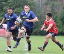 Excelsior flanker Oli Knopp makes a break up the park in their victory against Kurow last weekend...