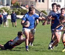 Southland Boys' centre Caleb Harvey carries the ball forward during an inter-school First XV game...