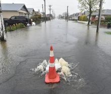 Flooding in Surrey St in October last year. PHOTO: GREGOR RICHARDSON