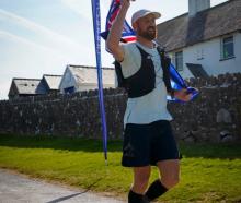 Former Dunedin ultra-distance runner Damian Watson nears the finish line of the Wild Horse 200 in...