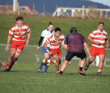 Clutha’s Sam Viliamu takes on Clutha Valley defender Regan Gillespie during the Southern Region...