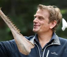 University of Otago visiting academic Dr Daniel Thomas, of Auckland, holds a 3-Dprinted ancient...