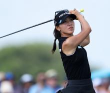 Lydia Ko of New Zealand hits a tee shot on the sixth hole during the first round of the PGA...