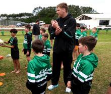 Fabian Holland runs a skills session with youngsters at the Coastal Rugby Club, in Taranaki,...